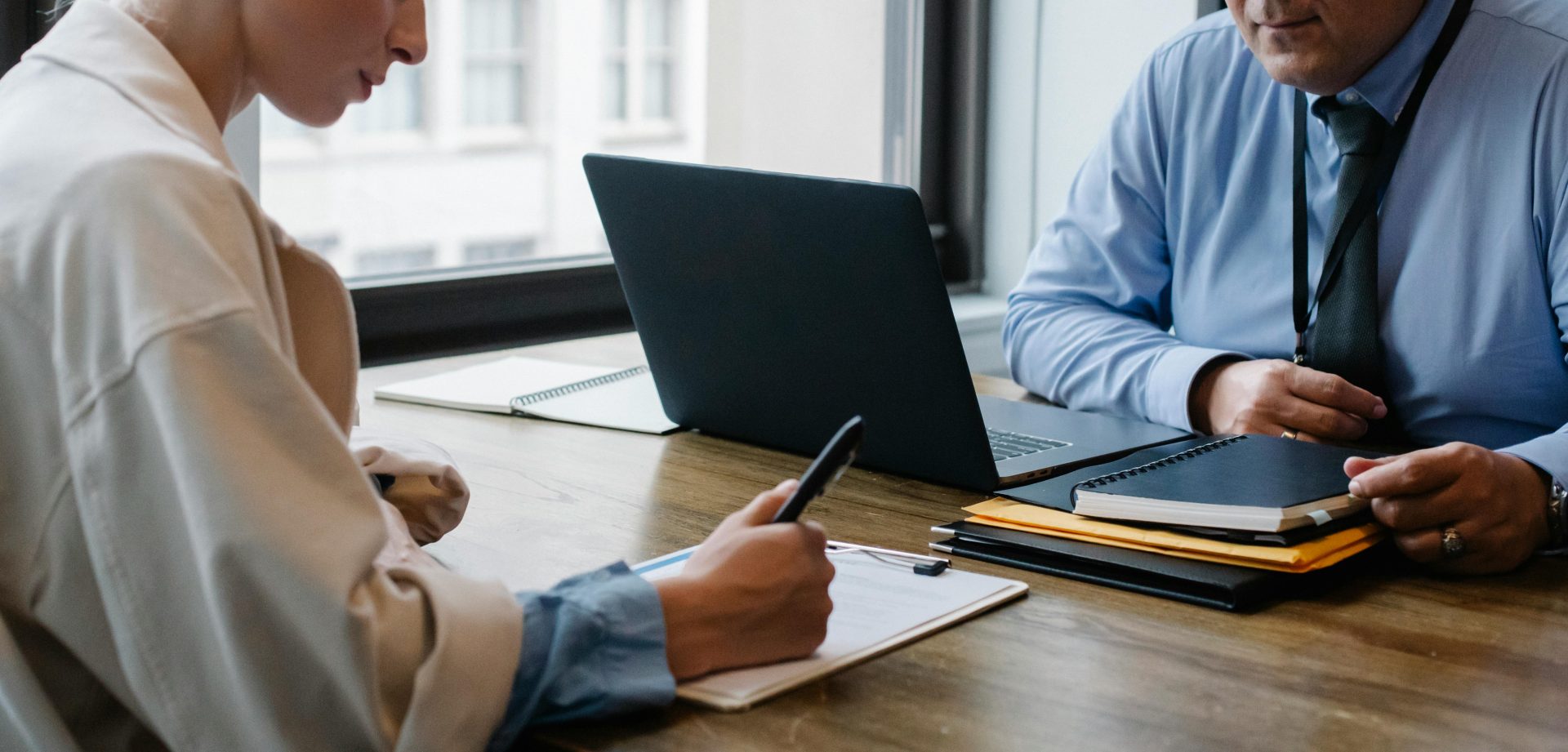 Crop business partners signing contract in office